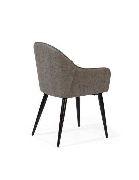 Silla de comedor con brazos ASLAD polipiel, patas metálicas en negro.