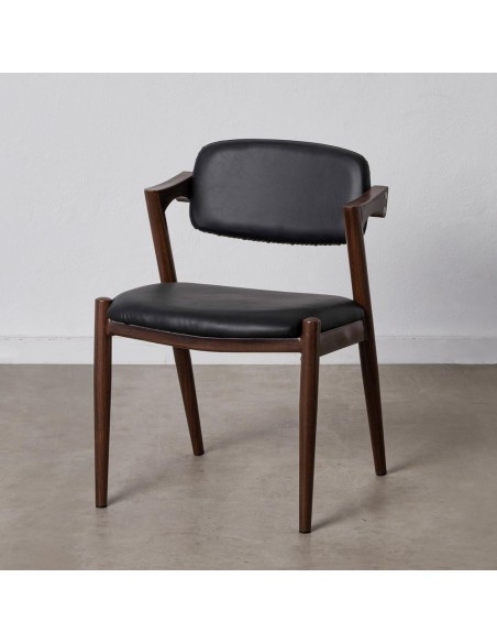Silla FONDES de metal con acabado nogal y cuero sintético negro.
