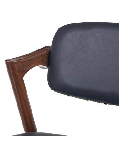 Silla FONDES de metal con acabado nogal y cuero...