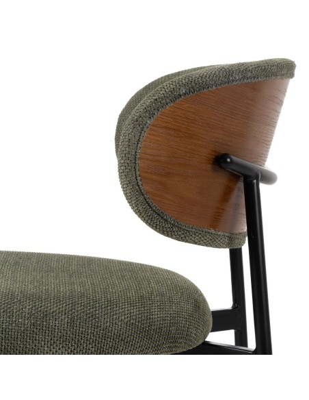 Silla de diseño RUNNIE de tejido en verde oscuro con patas de acero en negro.